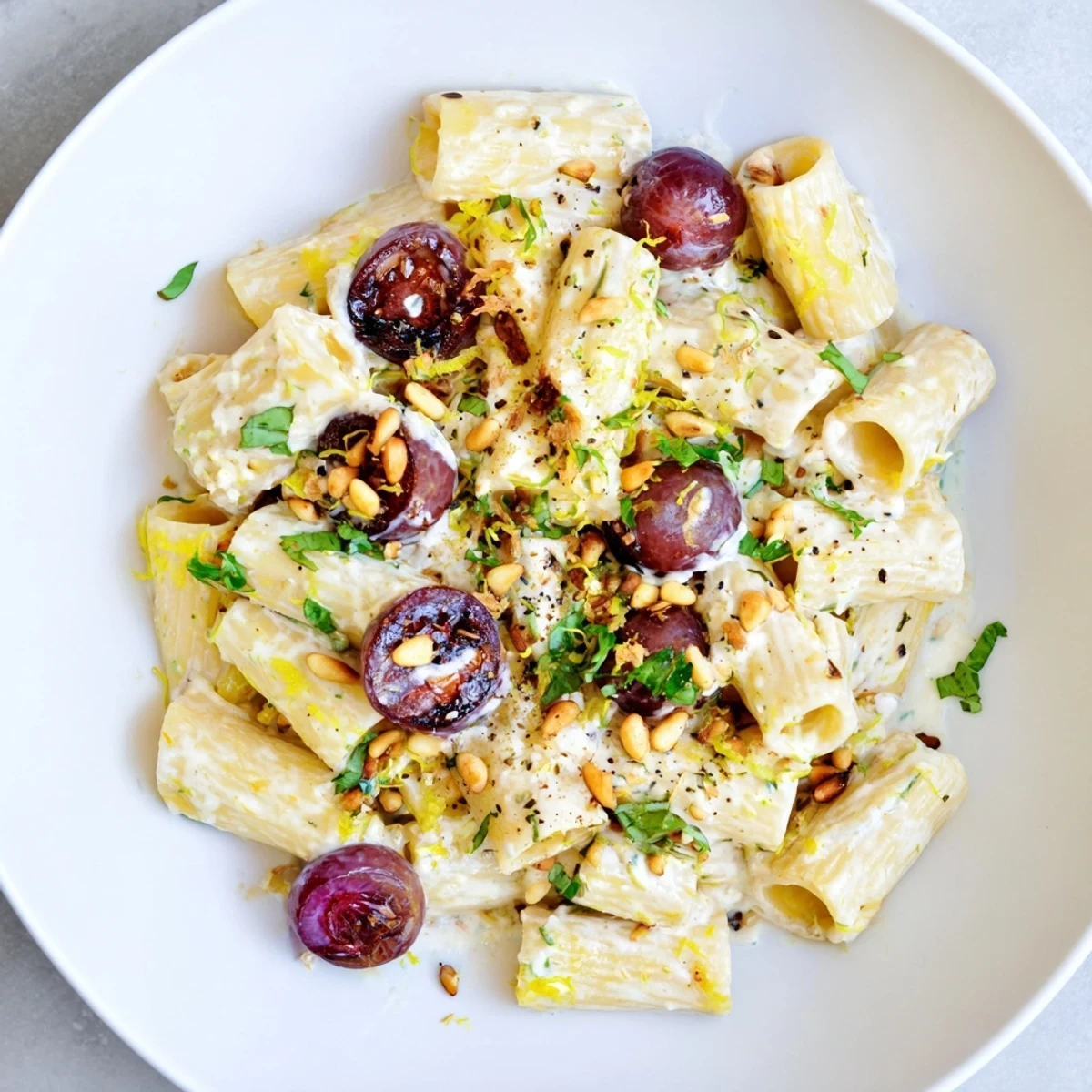 Pasta with Roasted Grapes and ricotta, showing a creamy, colorful, Italian-inspired vegetarian main course.