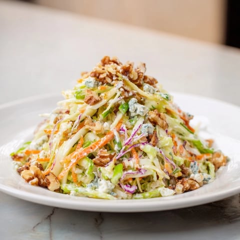 Crisp Crunchy Apple & Walnut Slaw: A beautiful slaw with blue cheese and toasted walnuts, ready to enjoy.