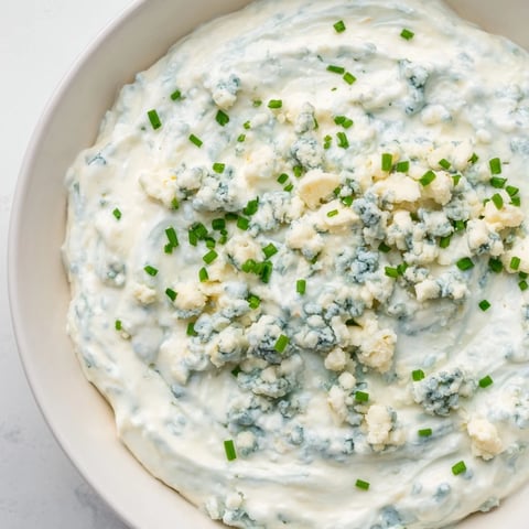 Creamy Frozen Pond Blue Dip Platter, a gorgeous appetizer with crisp chips and colorful veggies.