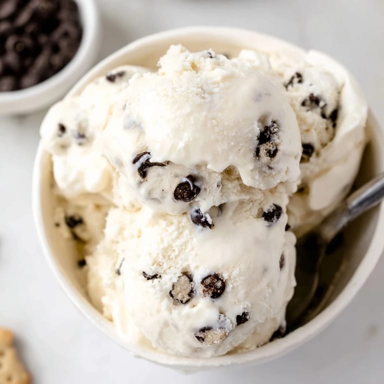 Indulge in Cottage Cheese Ice Cream, rich with cookie dough and creamy flavors.
