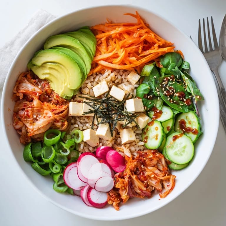 Nourishing fermented vegetable bowl featuring hearty grains, kimchi, and a savory dressing.