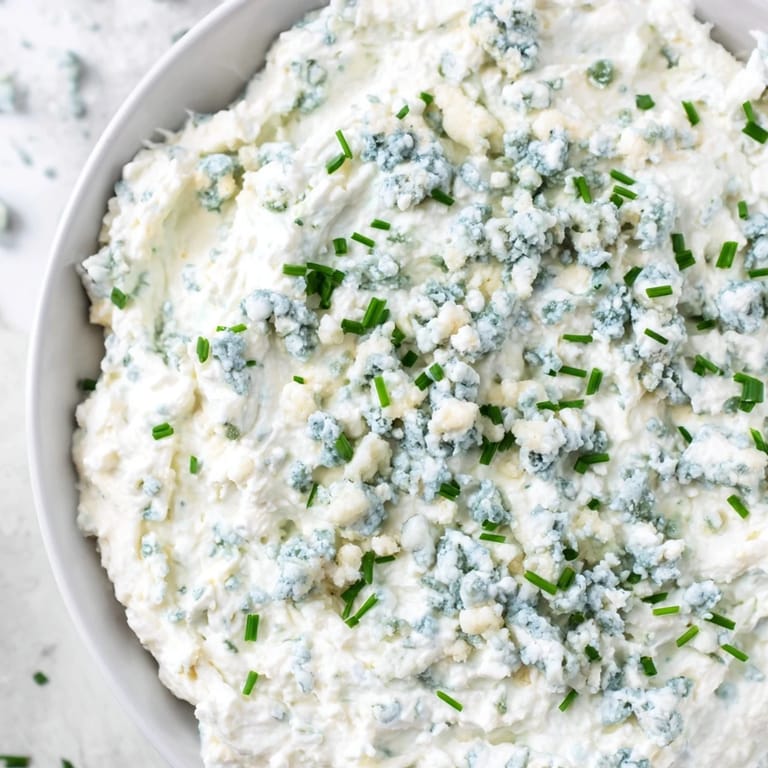 A stunning Frozen Pond Blue Dip Platter, perfect for parties; enjoy this chilled blue cheese treat.